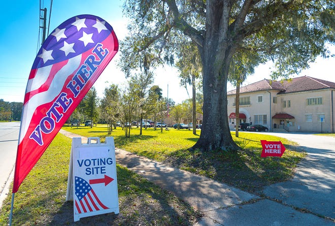 Signs in front of the Hastings Town Hall point to where residents can vote in an election on whether to disband the small town in southern St. Johns County on Tuesday, Nov. 7, 2016. (Peter.Willott@StAugustine.com)
