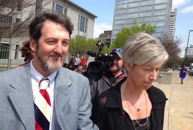 Former central Arkansas Circuit Judge Michael Maggio leaves the federal courthouse with his wife, Dawn, after being sentenced to 10 years in prison on a bribery charge in March 2016. [ARKANSAS NEWS BUREAU FILE PHOTO]