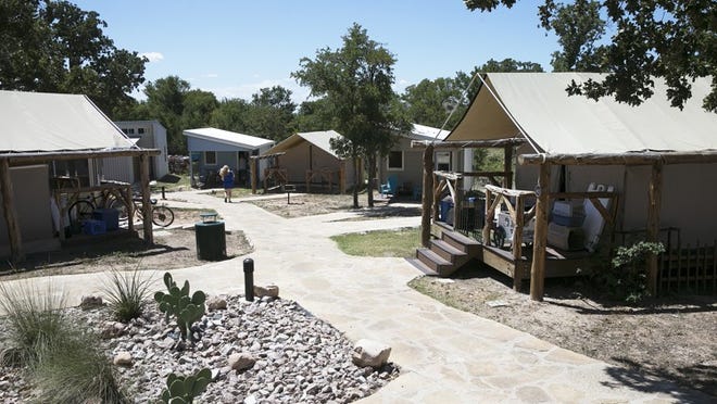 Homes sit along a pathway at Community First Village on July 27, 2017. DEBORAH CANNON / AMERICAN-STATESMAN