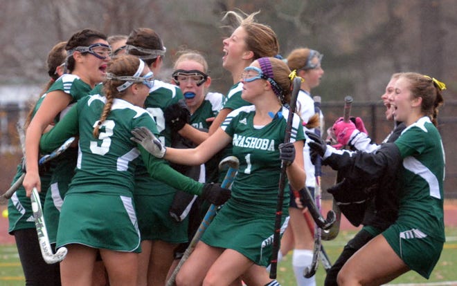 Nashoba celebrates their overtime goal to win the 2014 Central Mass. Division 1 title. [T&G Staff File Photo[