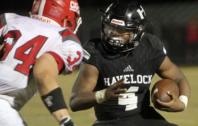 Havelock's Solomon Beligotti runs with the football against Jacksonville last week. The Rams are scheduled to play Burlington Williams at 7:30 p.m. Friday in a first-round playoff game at Havelock High.