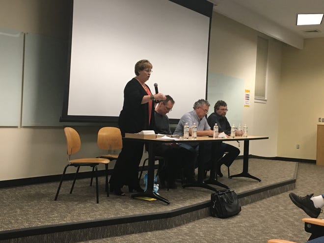 Attorney Kathy Brown discusses GenX on Friday, November 11 at UNCW's Cameron Hall. Brown was joined on a panel by N.C. State toxicologist Scott Belcher, UNCW economist Chris Dumas and UNCW biologist Larry Cahoon. [PHOTO BY ADAM WAGNER/STARNEWS]