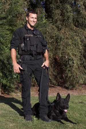 Eugene police dog Blek was hit and killed by a car on Friday near the home of his handler, officer Rob Griesel. The 8-year-old German shepherd was scheduled to work a final shift as a K-9 officer on Saturday before retiring with Griesel's family. (Dmitri von Klein)
