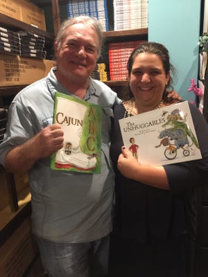"Cajun ABC" author Rickey Pittman and illustrator Alexis Braud show off their latest work for River Road Press. [Submitted]