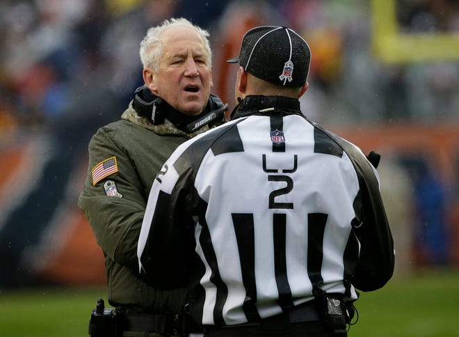 Chicago Bears head coach John Fox argues a call with line judge Bart Longson (2) during the first half of an NFL football game against the Green Bay Packers, Sunday, Nov. 12, 2017, in Chicago. (AP Photo/Nam Y. Huh)