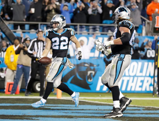 Carolina Panthers' Christian McCaffrey (22) runs for a touchdown against the Miami Dolphins in the first half of an NFL football game in Charlotte, N.C., Monday, Nov. 13, 2017. (AP Photo/Bob Leverone)