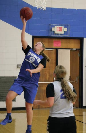 Gabby Ross makes a layup during practice. Ross, a sophomore, is among several Ogden players who could get significantly more varsity minutes this season. Photo by Andrew Logue/News-Republican