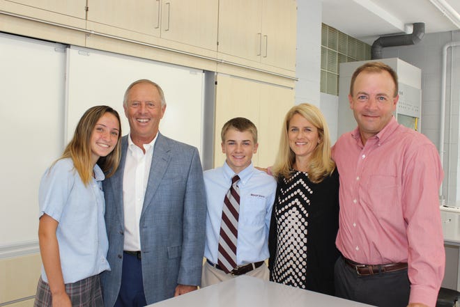 The biology lab at Bishop Stang High School in Dartmouth has been named for the late Rita Lafrance, matriach of the family behind White's of Westport, Bittersweet Farm, Ten Cousins Brick Oven and other businesses. From left: great-granddaughter Leah Fellows, son Richard Lafrance, great-grandson William Lafrance, granddaughter-in-law Janna Lafrance and grandson Christian Lafrance. [SUBMITTED]