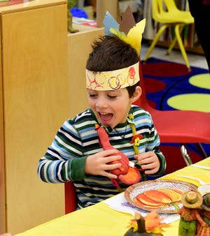 Preschooler Adam Sand, 4, holds a cloth turkey as he says what he is thankful for during a Thanksgiving feast at the Countryside Elementary School in Mount Laurel on Thursday, Nov. 16, 2017.  [CARL KOSOLA / STAFF PHOTOJOURNALIST]