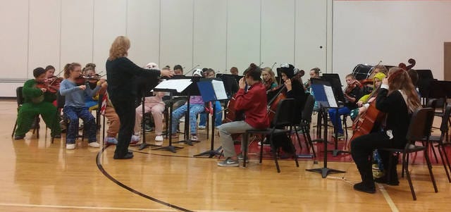 The Boone Middle School Orchestra performed Musette, Spider Web, You Are My Sunshine, Lullaby and We Will Rock You. Photo by Amy Cunningham/News-Republican