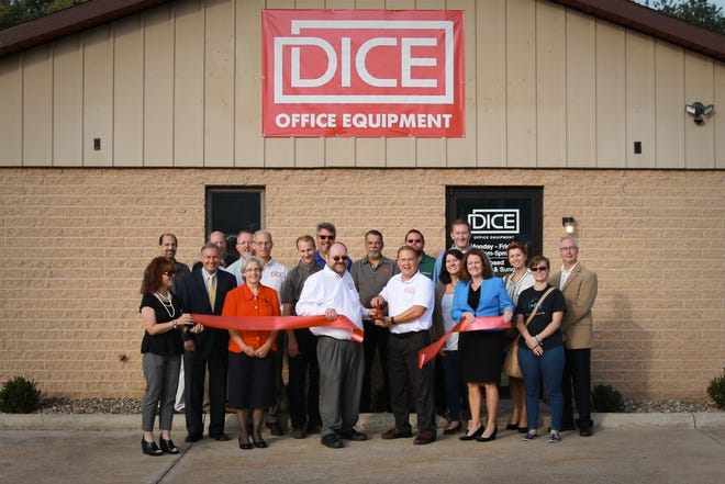 Local business and government representatives joined Dice Office Equipment for the ribbon-cutting ceremony for its new facility at 20 Commerce Ave.