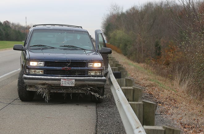 A motorist was arrested early Wednesday afternoon near Interstate 77 in southern Stark County after leading police on a chase from Strasburg. His northbound vehicle crossed the median into the southbound lanes. (TimesReporter.com / Jim Cummings)