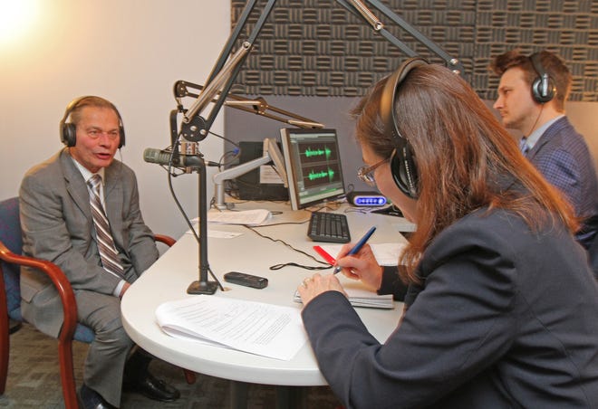 Senate President Dominick Ruggerio, left, in The Journal sound studio with staff writer Kate Bramson and social media editor Whitman Littlefield as they record an interview on Friday. [The Providence Journal / Steve Szydlowski]