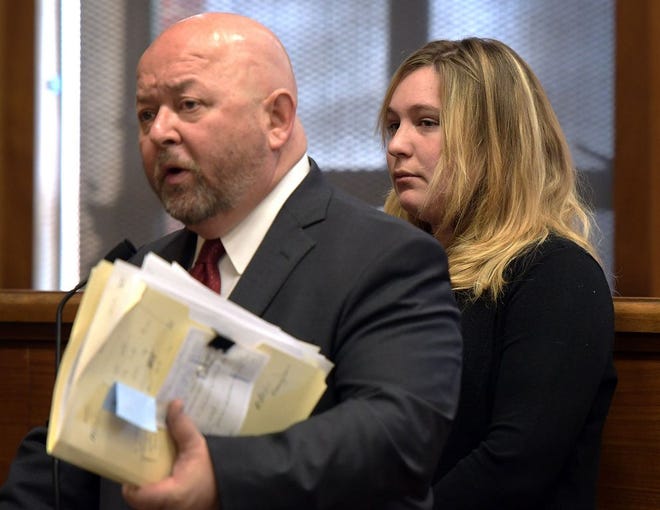 Alli Bibaud, right, and her lawyer, Michael Wilcox, in Framingham District Court on Friday. [T&G Staff/Rick Cinclair]
