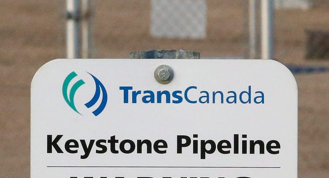 This file photo shows a sign for TransCanada's Keystone pipeline facilities in Hardisty, Alberta, Canada on Nov. 6, 2015. TransCanada Corp.'s Keystone pipeline leaked oil onto agricultural land in northeastern South Dakota, the company and state regulators said Thursday, Nov. 16, 2017, but state officials don't believe the leak polluted any surface water bodies or drinking water systems.