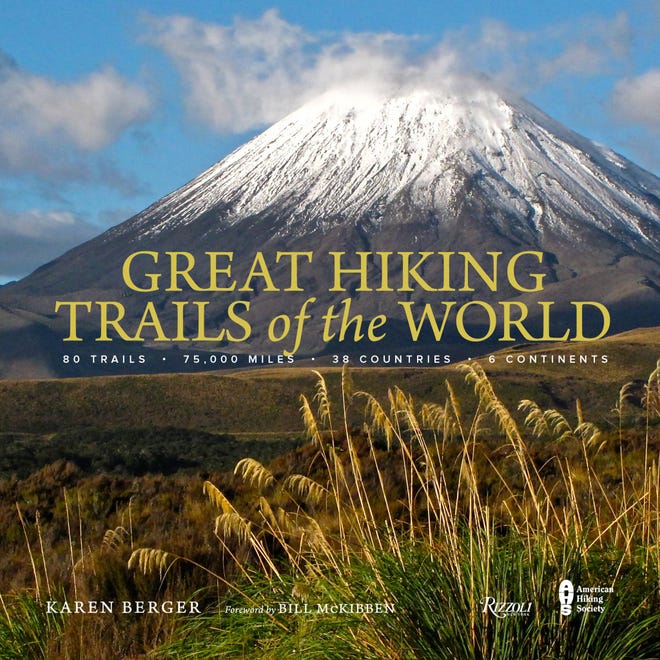 This undated image provided by Rizzoli shows the cover of “Great Hiking Trails of the World.” The coffee table-style book offers photos and descriptions of 80 trails in 38 countries on six continents around the world. (Rizzoli via AP)