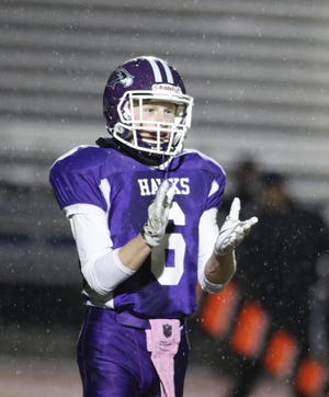 Marshwood High School senior Sam Cartmill applauds a play during the first half of Saturday's Class B football state championship game at Fitzpatrick Stadium. [Seacoastonline]