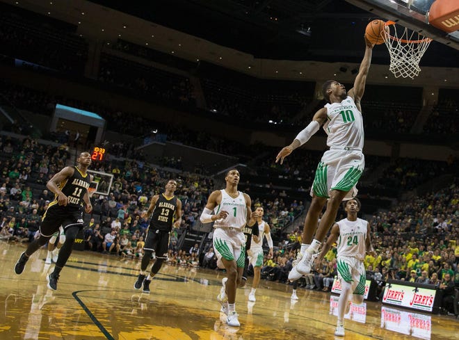 Oregon's Victor Bailey Jr. slams home two points during Oregon's 114-56 victory over Alabama State at Matthew Knight Arena in Eugene, Ore. Friday, November 17, 2017. (Brian Davies/The Register-Guard)