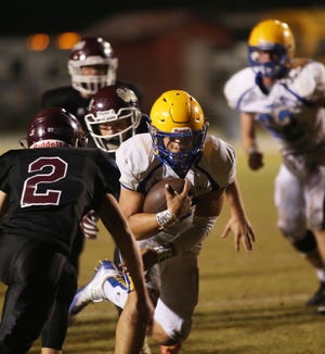 Chipley's Andrew Lawton scores on a short run against Baker. [MICHAEL SNYDER/DAILY NEWS]