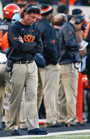 Oklahoma State football coach said the Cowboys need to move on instead of wondering "what could have been." Although OSU is 8-3, media predicted the Cowboys would contend for the Big 12 championship. [PHOTO BY NATE BILLINGS, THE OKLAHOMAN]