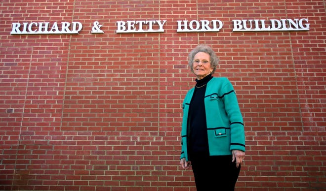 Betty Hoard stands with the Lawndale Museum building that was recently named in her and husband RichardþÄôs honor. [Brittany Randolph/The Star]