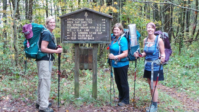 Beth Holiman, left, Jennifer Thomas, and Wendy Holland pose for a picture during their hike on the Appalachian Trail. [SUBMITTED]