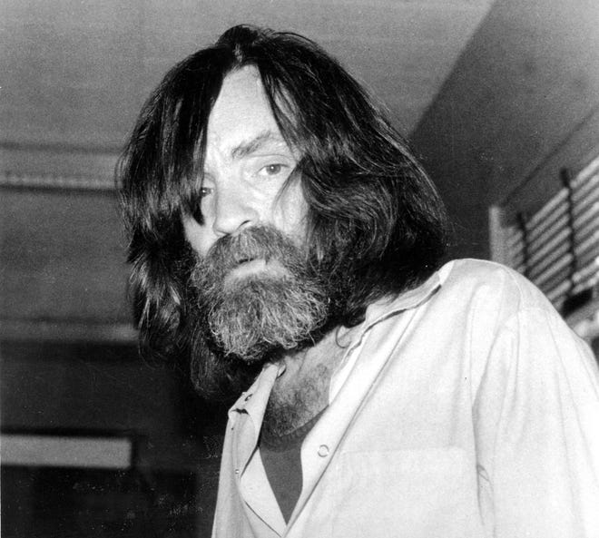 FILE - In this June 10, 1981 file photo, convicted murderer Charles Manson is photographed during an interview with television talk show host Tom Snyder in a medical facility in Vacaville, Calif. Authorities say Manson, cult leader and mastermind behind 1969 deaths of actress Sharon Tate and several others, died on Sunday, Nov. 19, 2017. He was 83. (AP Photo, File)