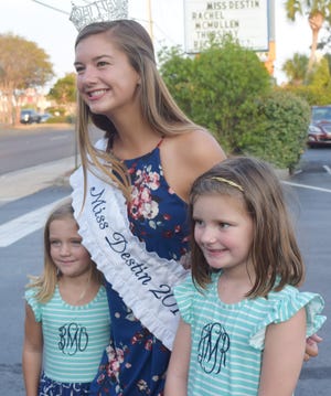 Miss Destin 2017 Rachel McMullen poses with two little fans, Olive, left, and Hazel Ray, earlier this year at the Meet Miss Destin event at The Inn on the Harbor hotel. [FILE PHOTO]