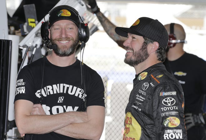 Crew chief Cole Pearn (left) and new champ Martin Truex Jr. had the secret sauce this year. [Associated Press/Terry Renna]