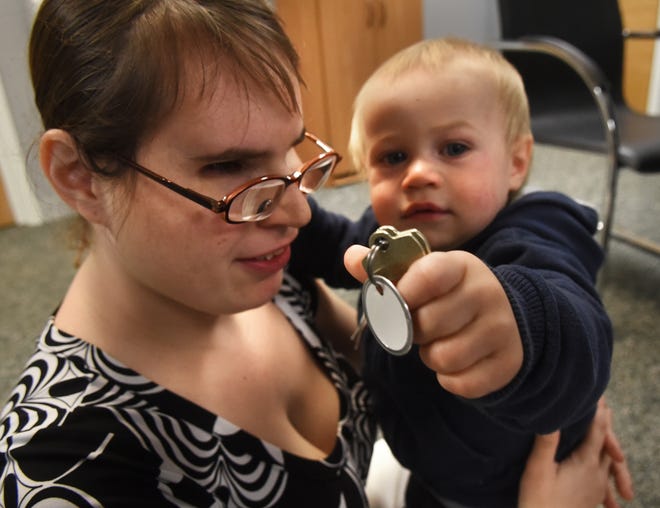 Nicole Van Coppenolle, who is legally blind, and her 1-year-old son, Aiden, rencently moved into a Rochester Housing Authority apartment. [Deb Cram/Fosters.com and Seacoastonline]