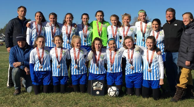 The Great Bay United Soccer Club U15 girls team won the Division 1 state championship earlier this month. The team went 14-0-1 on the season. All of the girls reside in either Portsmouth, Newington, Rye or Greenland. Pictured back row (from left) is coach Marc Griffin and players Mia Smith, Ophelia Suttie, Brady Beland, Zoe Flynn, Sofia Ranalli, Megan Martin, Ellie Seefried, Katie Campel, Arden Griffin, coach Mickey Smith and coach Lauren Greenwald; pictured front row (from left) is coach Jeff Suttie, Adison Long, Molly McCafferty, Julia Roelofs, Madison Lydon, Julia Welsh, Kellsie Flint and Skye MacLeod. [Courtesy]