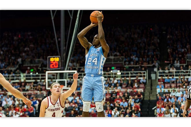 THAT IS GOING IN — UNC’s Kenny Williams drills a shot against Stanford.