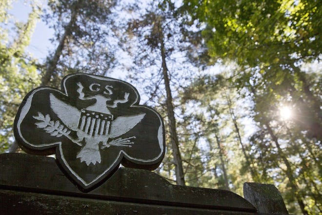 The official Girl Scouts crest marks the entrance of a Girl Scout Camp in Lapeer, Mich.