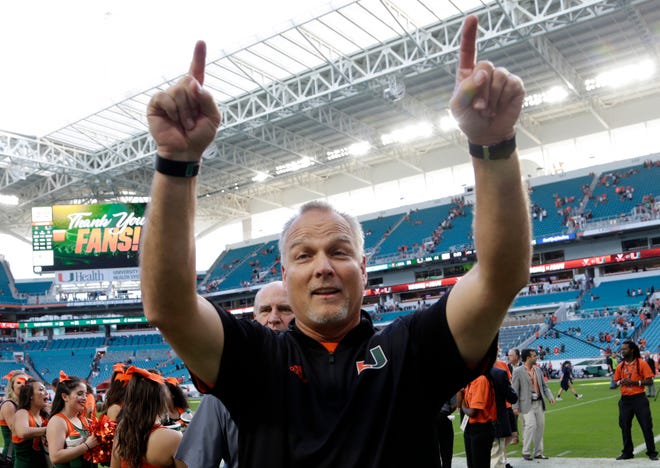 Miami head coach Mark Richt walks off the field after the Hurricanes' 44-28 win over Virginia Saturday in Miami Gardens. [THE ASSOCIATED PRESS / LYNNE SLADKY]