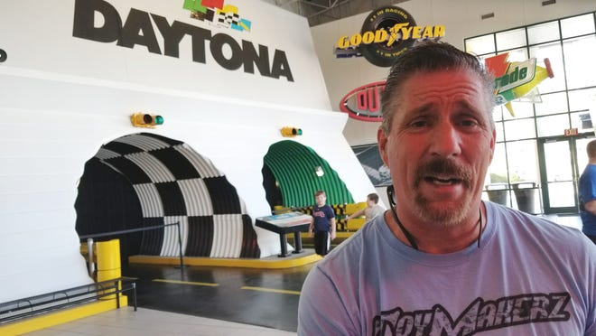 David Ankin, star of TV show “ToyMakerz,” talks exotic cars at Daytona International Speedway. [NEWS-JOURNAL/GODWIN KELLY]