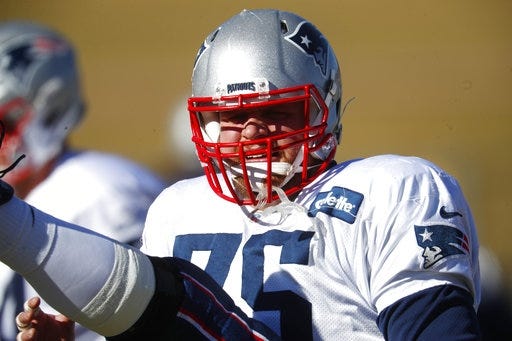 Patriots offensive lineman Ted Karras, shown stretching his leg before practice on Nov. 15 at the Air Force Academy, is preparing to make his second straight start at center with David Andrews missing practice again because of an undisclosed illness. [AP Photo/David Zalubowski]