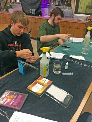 Students Jakob Lester and Ethan Sleeth work on their lab exercise. Contributed photo