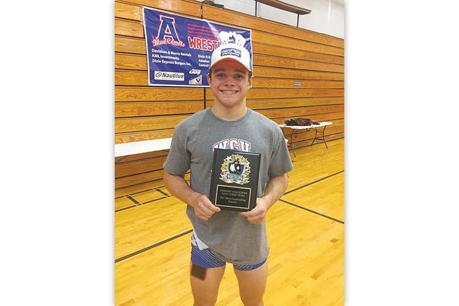 Asheboro's Austin Curry was named Most Outstanding Wrestler at Saturday's Cold Turkey Duals at AHS.