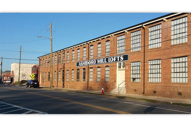 HTC IMPACT — Asheboro Mill Lofts was funded, in part, by Historic Tax Credits. The elimination of the credit could hinder plans for the Square on Church, being developed next door by Dustie Gregson and Jerry Neal. (Micki Bare / The Courier-Tribune)