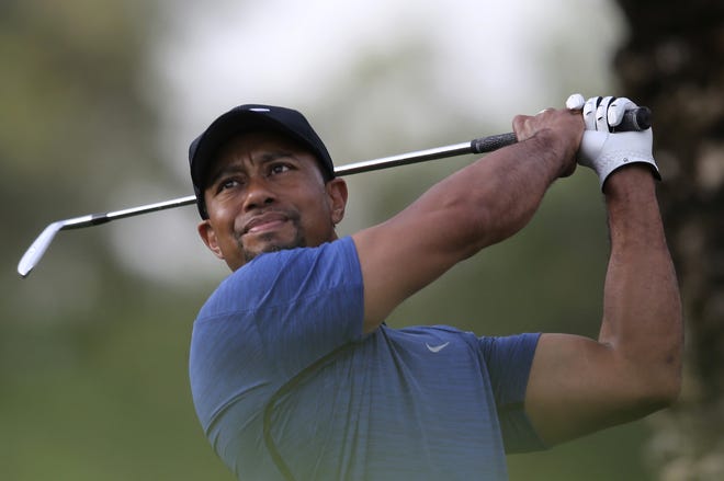 Tiger Woods returns to tournament golf this week at the Hero World Challenge. [Associated Press File/Kamran Jebreili]