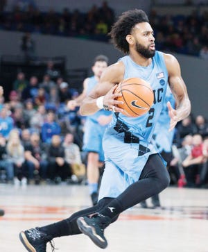 WE WILL DO BETTER — Joel Berry and UNC will be looking for a 
better shooting performance tonight against Michigan.