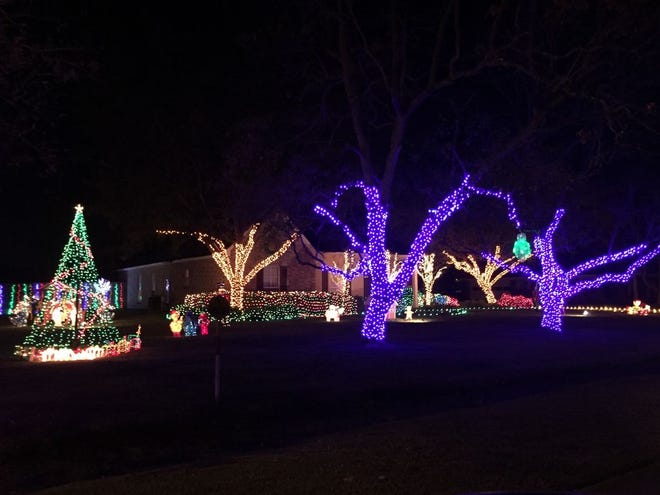 A home is festively lit up on E Rosedown in Gonzales.