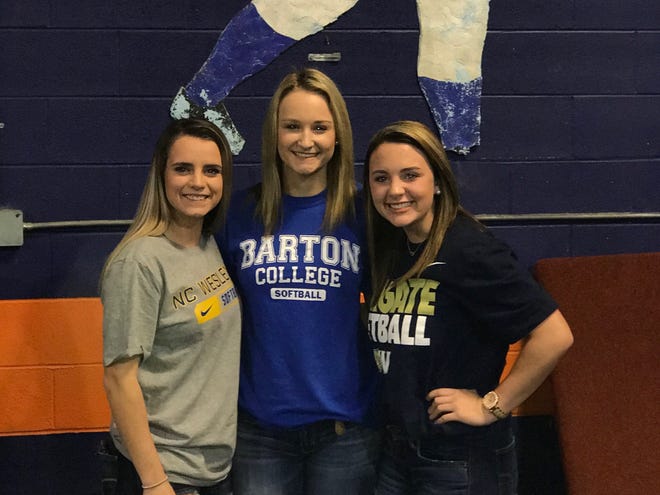 Cape Fear softball players Kaylee Tanner, Sidney Gronowski (center) and Sammi Jo Loney (right) made commitments to their college choices in a ceremony at the high school Nov. 20, 2017. [Contributed photo]
