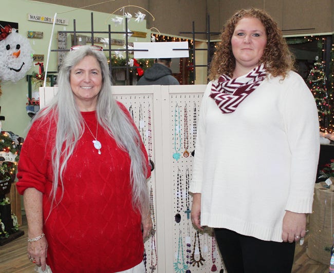 Sharon Houchin, left, and her daughter Brandy Chase, have opened a new craft shop in downtown Wyoming. The new business is known as Handmade 4 U and features an assortment of handcrafted items.