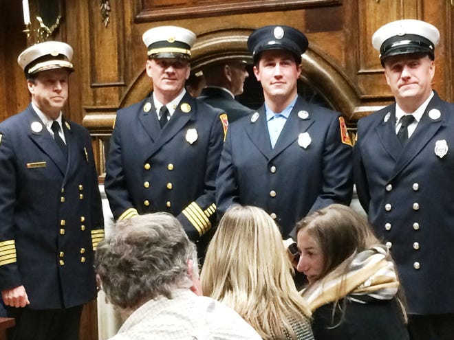 From left are Fire Chief Kevin Partridge, new Deputy Fire Chief Timothy Griffin, acting Lt. Jonathan Carroll and acting Capt. John Dzialo.

[Wicked Local Photo/Donna Whitehead]