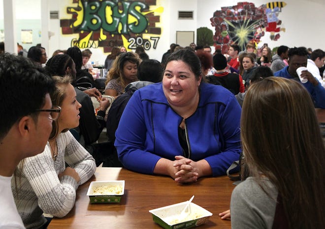 Bessemer City High School Assistant Principal Meghan LeFevers talks with students in the lunchroom at Bessemer City High on Thursday, Nov. 30, 2017. LeFevers has been named the 2018 North Carolina Secondary Assistant Principal of the Year. [JOHN CLARK/THE GASTON GAZETTE]