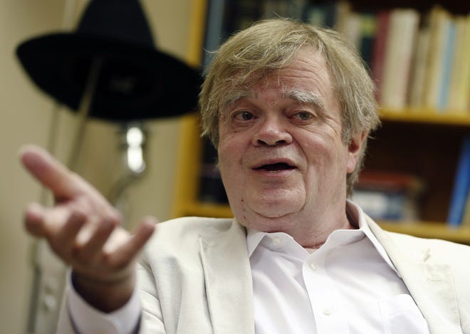 In this July 20, 2015 file photo, Garrison Keillor, creator and host of "A Prairie Home Companion," appears during an interview in St. Paul, Minn. Keillor said Wednesday, Nov. 29, 2017, he has been fired by Minnesota Public Radio over allegations of improper behavior. (AP Photo/Jim Mone, File)