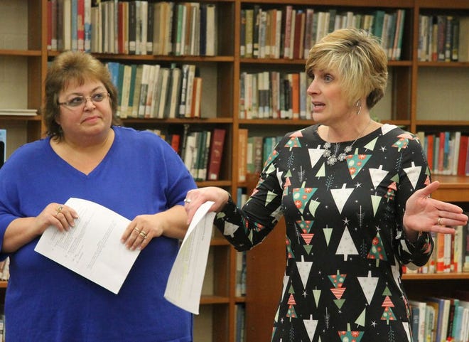 Melissa Krull, right, reading coach at White Pigeon Central Elementary, talks to White Pigeon Community Schools Board of Education about efforts to prepare young students to read. Left, Lori Shoppell, reading interventionist teacher.