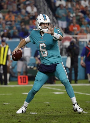 Miami Dolphins quarterback Jay Cutler (6) looks to pass during a game against the Oakland Raiders on Nov. 5 in Miami Gardens. [AP Photo / Lynne Sladky, File]
