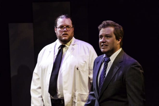 Rik Robertson, left, plays a research assistant and Colton Larsen plays his subject, the mentally challenged Charlie Gordon in the Manatee Players production of "Flowers for Algernon." [Manatee Players photo / Brian Craft]